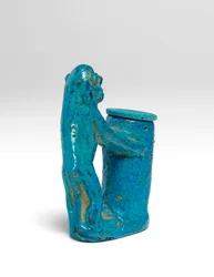 Kohl pot, in the form of a monkey faience